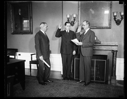 Swearing-in; Ogden Mills, left
