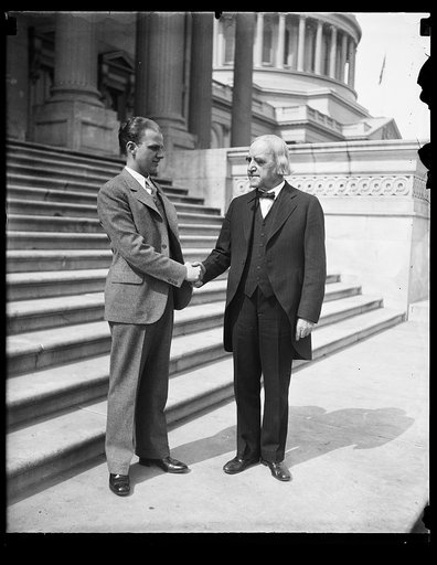 Hand shake in front of U.S. Capitol, Washington, D.C.