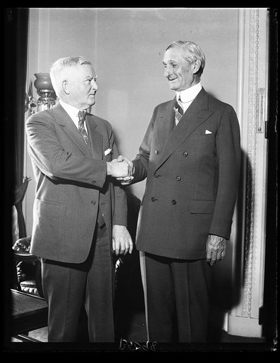 Speaker Garner greets William Gibbs McAdoo. William Gibbs McAdoo, former Secretary of the Treasury under Woodrow Wilson, received a warm greeting form Speaker of the House John N. Garner at the Capitol today. McAdoo, who arrived in Washington by plane today, is leader of the Garner-for-President mov