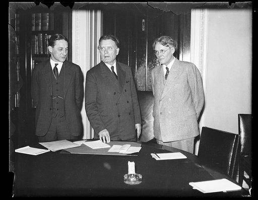 William Borah, center