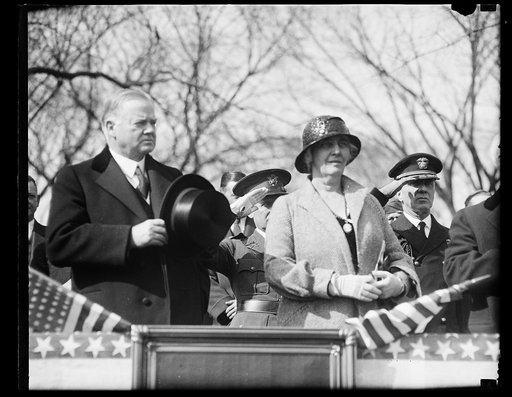 Herbert Hoover and Lou Hoover on viewing stand