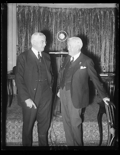 Gov. Albert C. Ritchie of Maryland and John W. Davis of West Virginia, talking things over at the lower right