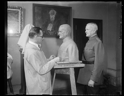Sculptor creating bust of John J. Pershing