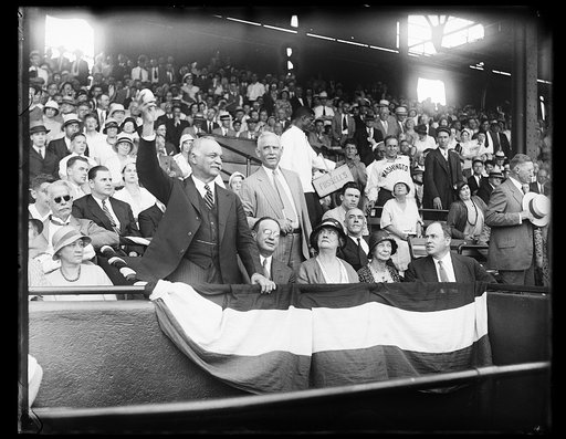 Charles Curtis throwing baseball at game