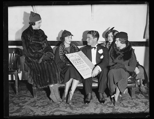 Group with sign for Gala Opening of Bamboo Room