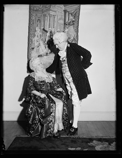 Man and woman in colonial costumes