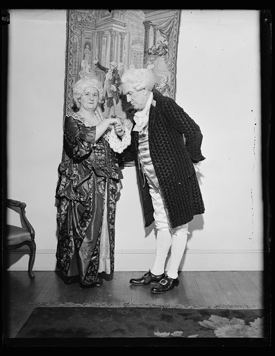 Man and woman in colonial costumes