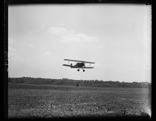 Aerial golf at College Park. Throwing ball from plane