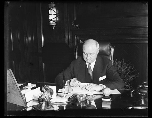 James Farley at desk