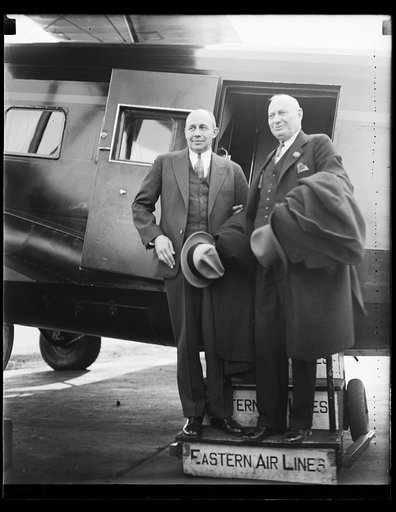 Men at airplane door