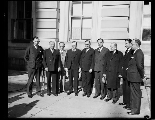 Group: Rush D. Holt, left; Joseph T. Robinson, 5th from left