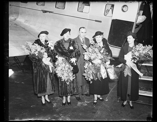 Mrs. Wilson's first flight. Mrs. Woodrow Wilson, widow of the war-time president, completes her first airplane flight. She was in the ship piloted by Capt. Eddie Rickenbacker, who made a dawn-to-dusk flight from New Orleans to New York and return. A stowaway, Miss Marie Reynolds, extreme right, was 