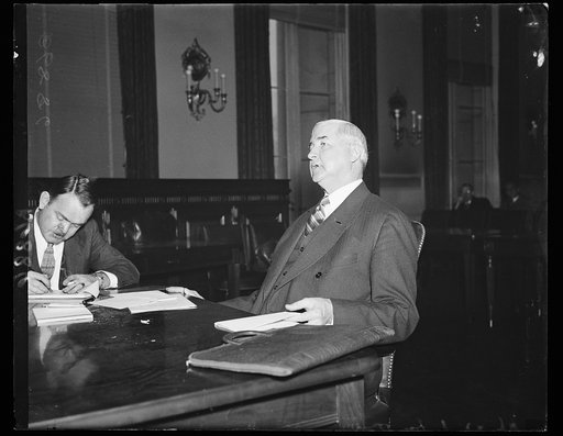 RFC Jones. This informal picture of Jesse Jones, chairman of the R.F.C., was made during a House hearing on the proposed extension of the loaning agency. 1/21/35