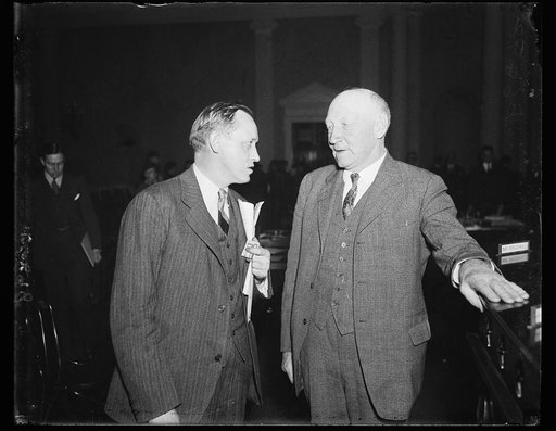 Hopkins and Doughton. Harry Hopkins of FERA, left, appeared before the House Ways and Means Committee in support of the Administration's Social Security program. He is shown here with Rep. Robert L. Doughton, chairman of the committee. 1/23/35