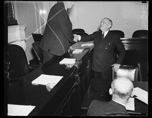The glad hand. Sen. Robert F. Wagner, D. of N.Y. testifies before the Senate Finance Committee regarding old-age pensions. 1/22/35