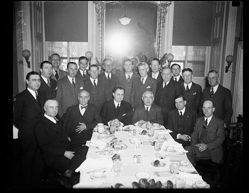 This group of congressmen is organizing for a vigorous fight to put the soldier's bonus bill through the House. From left to right, seated: Abe Mudock of Utah, A.J. May of Ky., Wright Pattman of Tex., Adolph Sabath of Ill., Clarence Cannon of Mo., Wm. P. Connery Jr. of Mass., (second row) Gerald J. 