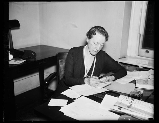 Rep. Caroline O'Day, D., of New York, photographed at her desk in the House office building. She is Congressman-at-[large?] from the state. She was supported by Mrs. [Roo?] during her campaign. 1/16/35
