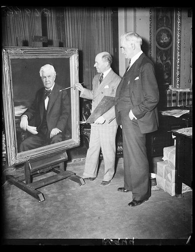 Borris B. Gordon puts finishing touches to his portrait of Rainey while Speaker Joe Byrns watches
