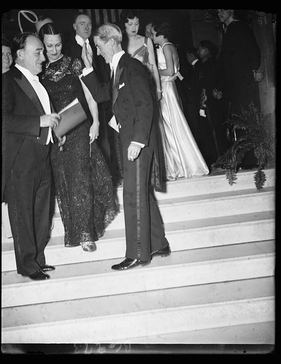 Roosevelt's stand-in. Marvin McIntyre, Secretary to President Roosevelt, attends the birthday ball at the Shoreham Hotel as his chief remained at the White House to deliver a radio address. He is here greeting Rep. and Mrs. John J. O'Connor, D. of N.Y., at the left of the picture. 1/30/35