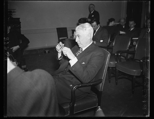 Barney Baruch. Barnard M. Barush, testifying before the House Military Affairs Committee on war profits, takes his time answering questions. 1/25/35