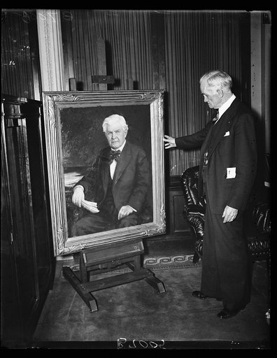 Another one for gallery. Speaker Joe Byrne is photographed with the oil painting of the late Speaker Henry Rainey, by Boris D. Gordon, which will hang in the Speaker's gallery of the Capitol. 1/28/35