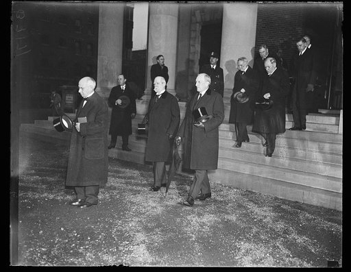 Charles Evans Hughes, center