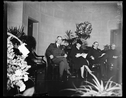 Group; George Dern, left, and Frances Perkins 2nd from left