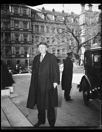 Man at White House; State, War and Navy Building in background. Washington, D.C.