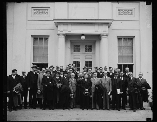 Group of men outside White House, Washington, D.C.