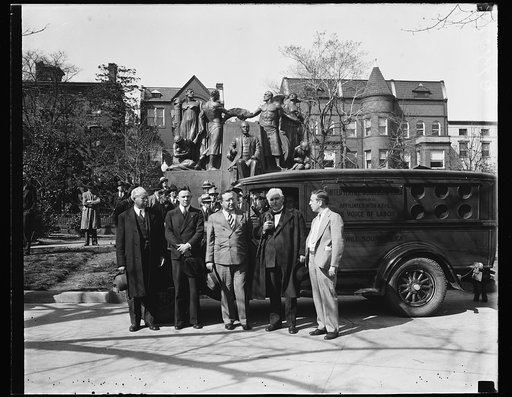 Group with United Textile Workers of America truck in front of Samuel Gompers Memorial, Washington, D.C.