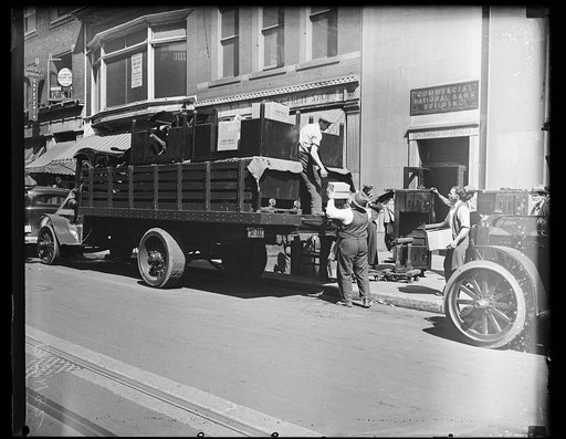 Desks on truck at Commercial National Bank Building