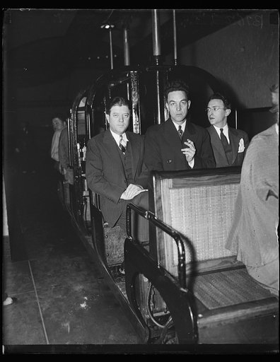 Group on U.S. Capitol subway; Robert M. La Follette, Jr., left