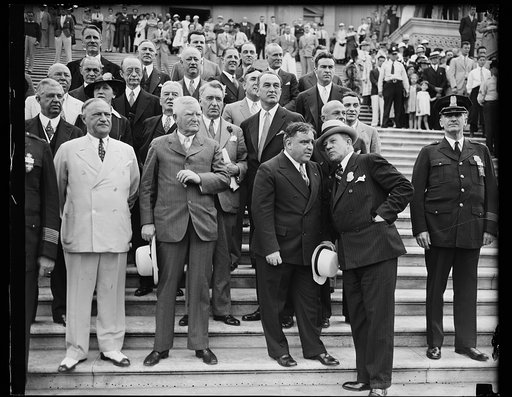 Group on steps, including John Nance Garner, Royal S. Copeland, Fiorello La Guardia