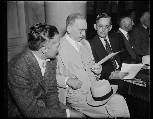 Daniel C. Roper, center