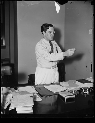 Rush D. Holt at desk