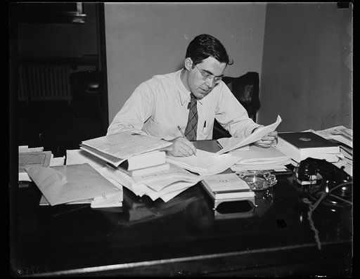 Rush D. Holt at desk