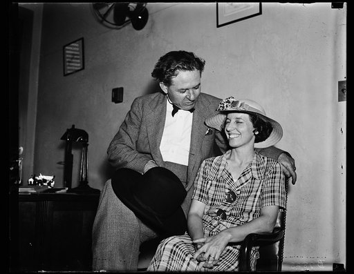 Serious for a moment. Rep. Percy L. Gassaway, irrepressible Dem. of Okla. in a serious moment as he p[...] with the one who knows him best, Mrs. Percy L. Gassaway. Rumor has it, and the Gassaway's don't deny it [...] that they are taking off for home shortly