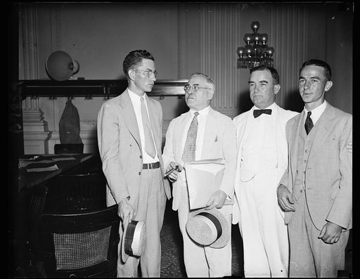 They believe the box contained cigars. This quartet, photoed Thursday at the House lobby hearing made more news this week. L. to r.: Norman Shook, nephew of Rep. Patton, (who was reported to have said "Hell, that box did not contain cigars") Rep. Adolph J. Sabath (D. of Ill), Rep. Nat Patton (D. of 
