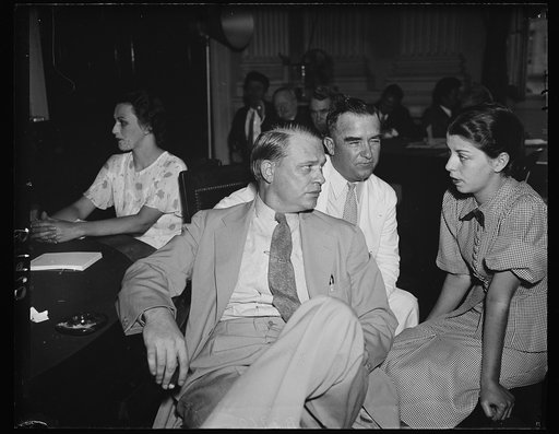 Wash. D.C. Principals. Rep. Martin Dies (D. of N.Y.) front, who was the principle cross-questioner at the House lobby inquiry Friday. Rep. Nat Patton (D. of Texas) who is a principle involved in the hearing, as to whether or not he received "cigars" in a cigar box from a Utility Lobbyist (in rear) a