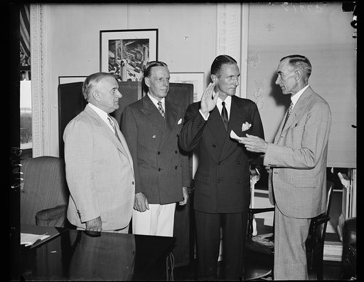 Biddle sworn in as Minister to Norway. Exclusive picture was taken Tuesday when Anthony J. Drexel Biddle, Jr., was sworn in as minister to Norway in the State Dept. bldg. Left to right: Sen. Joseph F. Guffey (D. of Penn.), Acting Sec. of State William Phillip, Minister to Norway Biddle and Percy F. 