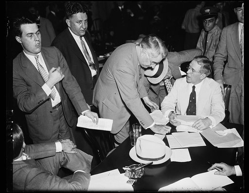 Sifting graft charges. Sen. Royal S. Copeland, D. of N.Y., left, chairman of the Senate Commerce Committee hearing graft charges offered by Ewing Y. Mitchell, right, ousted Assistant Secretary of Commerce. Mitchell was criticised several times by senators who said he was not revealing new informatio