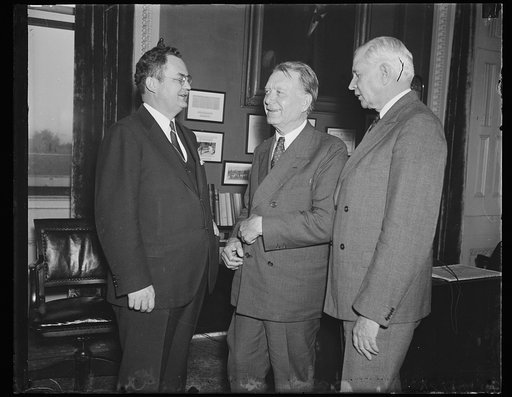 William Borah, center