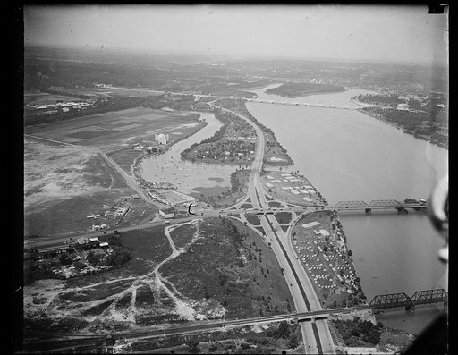 No scouts here. This airview shows a portion of the tent city erected along the banks of the Potomac river where the Boy Scouts were scheduled to hold their Jamboree late this month. It was postponed by President Roosevelt for a year because of infantile