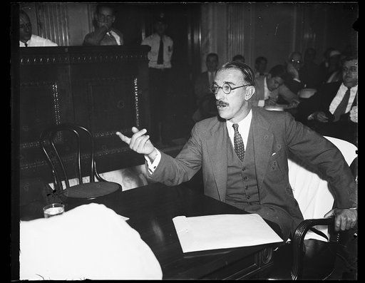 Low-down on utilities. W.B.S. Winans, Comptroller for Cities Service Co., testifies before the Senate Lobby Investigating Committee. He told of certain letters being mailed to stockholders urging that they ask Congress to kill the Wheeler-Rayburn utility