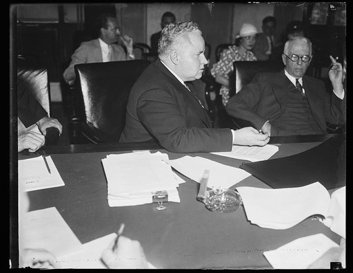 Speaks for Coughlin. Louis B. Ward of Detroit, appears before the Senate Banking and Currency as the emissary of Father Charles E. Coughlin, the radio priest of Detroit. Ward extended the frequently repeated financial philosophy of the priest into the records of the committee considering the Adminis