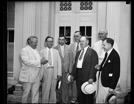 Ask for 113 million... A group of western senators leaving White House after urging Pres. Roosevelt to aid speedy allocation of funds for reclamation and irrigation projects in their states. Left to right: Pat McCarran, D. Nev., Carl Hatch, D. New M., Dennis Chavez (D. New Mex), Lewis B. Schwellenba