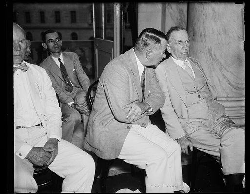 Defendants. Joseph Weaver, left, head of the Bureau of Navigation and Steamboat Inspection, and Secretary of Commerce Daniel C. Roper, photographed at the Senate Commerce committee where Ewing Y. Mitchell, ousted assistant Secretary of Commerce, charged that steamboat inspectors accepted "gratuities