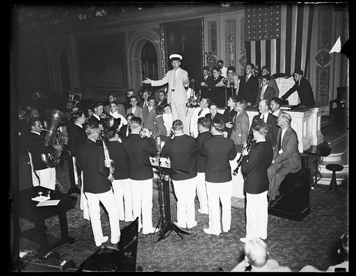 Rep. Wm. P. Connery of Mass. leading the Navy band at adjournment of the House, 8/27/35