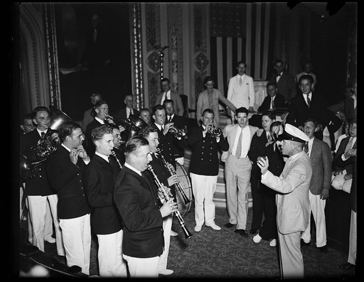 Wash. D.C. Master of ceremonies, Rep. William P. Connery, Jr., of Massachusetts, takes the floor to lead the Navy Band, which played many tunes for the representatives, principally, "Home Sweet Home." 8/27/35