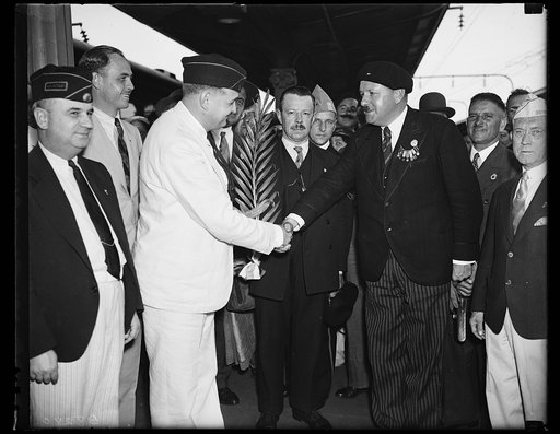 Wash. D.C. French Vets at Capital. A delegation of French veterans of the World War arrive in Washington and receive the greetings of the American Legion. From the left: Wm. N. Morell, national chairman of the American Legion Committee; J. Daligaux, veteran of the French Army, and John Berard, presi